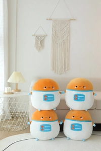 Close-up of soft astronaut robot plush toys on a rug in a modern living room