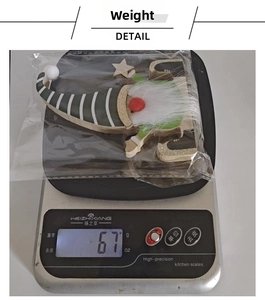 Detail of a festive Christmas wood gnome ornament being weighed on a digital scale