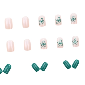 Press-on nail set featuring mint green, nude pink, and hand-painted floral patterns