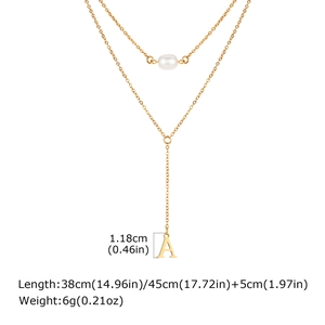 Gold Y-shaped necklace detail showing A letter pendant size and pearl accent dimensions