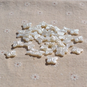 Bulk pearlescent butterfly charms for DIY jewelry making and hair accessories