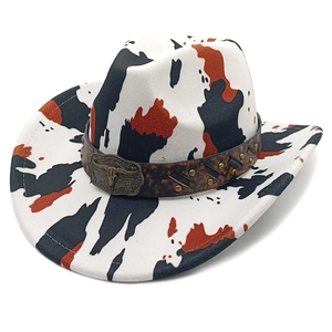 Retro western cow print cowboy hat with vintage bull head buckle and brown studded band