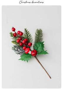 Close-up of Christmas pick with red berries, mushrooms and pine needles for tree decor