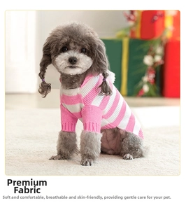 Close-up of pink and white striped knit dog sweater with high collar design for warmth
