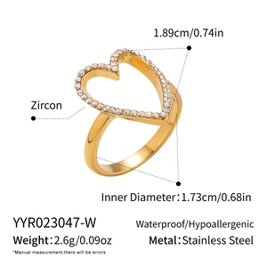 Detail showing the 1.73cm inner diameter and heart-shaped zirconia setting of the gold ring