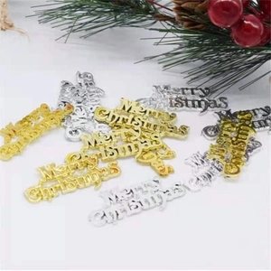 Golden and silver Merry Christmas letter signs for holiday tree and gift decoration