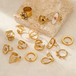 Collection of minimalist 18k gold plated stainless steel rings with various chic patterns