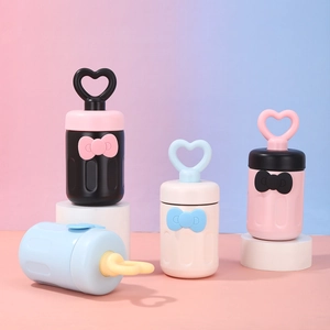 Cute insulated stainless steel mugs with heart handles and bow details in pastel colors