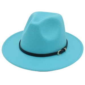 Macro detail of teal wool fedora hat with a black leather band and golden metal buckle