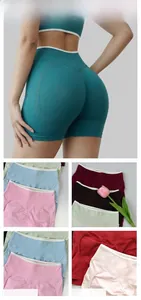 Detail view of seamless yoga shorts showing high waist, stitching, and V-shape booty lifting