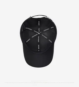 Detail view of the black baseball cap interior featuring branded tape and reinforced seams
