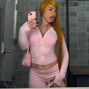 Detailed view of pink hooded zip-up top and matching high-waist pants with seam accents