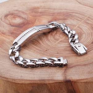 Men's silver titanium steel cross bracelet with cubic zirconia on cuban chain link