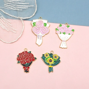 DIY enamel flower pendants with rose and sunflower designs for jewelry making
