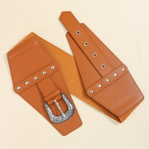 Vintage brown elastic wide belt with ornate silver buckle and rivet details for dresses
