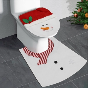 Detail of Christmas snowman toilet cover set featuring plush lid and non-slip floor mat