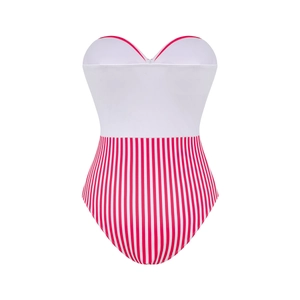 Detail of white bandeau swimsuit featuring vertical red stripes and elastic texture