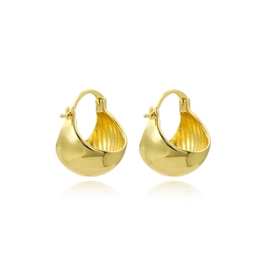 Elegant gold teardrop earrings with a polished surface and ribbed interior design