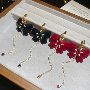 Elegant velvet bow long tassel earrings with sparkling crystals for autumn and winter outfits