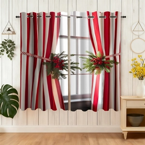 Detail of red and white striped Christmas curtains with festive berry tiebacks and eyelets