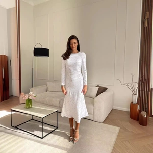 Elegant white floral midi dress with long sleeves and cinched waist for formal social events