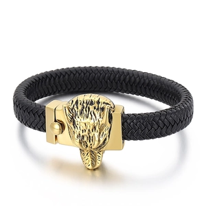 Retro black braided leather bracelet for men featuring a golden stainless steel wolf head clasp