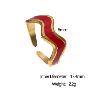Detailed view of 6mm wave-shaped 18k gold plated stainless steel ring with red enamel