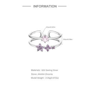 Macro detail of S925 sterling silver ring with pink zircon and purple petals