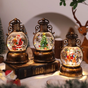 Retro bronze Christmas snow globe lanterns set with warm LED lights and festive figurines
