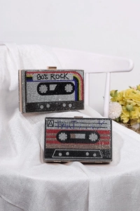 Detail of vintage cassette clutch bags with sparkling rhinestones and metal clasps