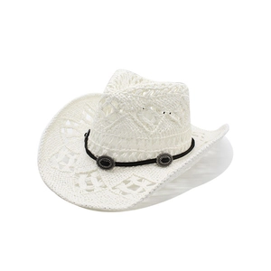 Detail of white hollow woven straw cowboy hat with black band and silver metal buckle