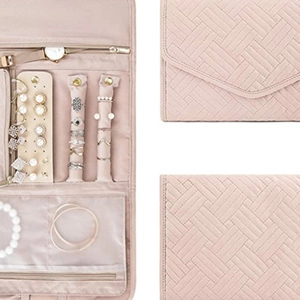 Quilted nude pink jewelry organizer with compartments for rings, earrings and necklaces