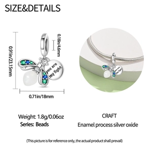 Detailed view of silver firefly charm with You Are My Light engraving and dimensions
