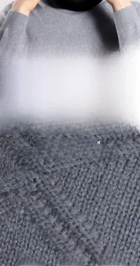 Detailed close-up of premium thermal knit fabric showing texture and soft inner lining