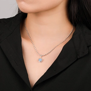 Elegant 925 sterling silver necklace with heart pendant and sky blue gemstone for women