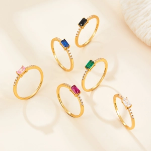 Close-up of S925 silver gold-plated rings with colorful emerald-cut cubic zirconia