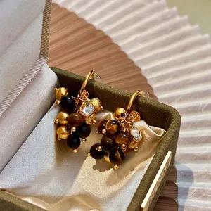 Retro tiger eye stone tassel earrings with zircon and gold beads in a green velvet box