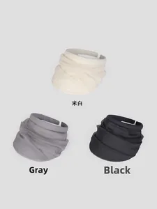 Detailed view of lightweight organza sun visors in cream, grey, and black color options