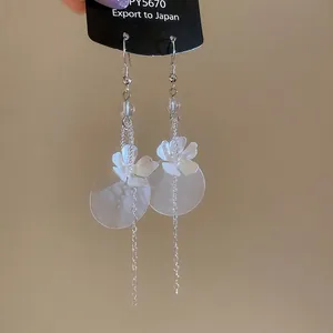 Elegant white floral tassel earrings with frosted circular shell pendants for women