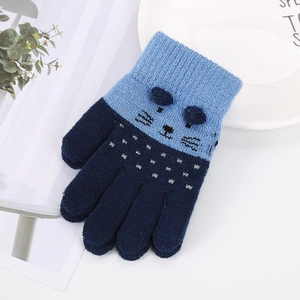 Detail of warm blue knitted cat gloves for kids with 3D ears and glitter accents