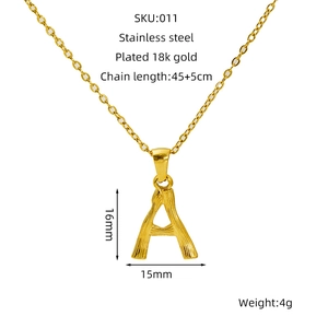Detail showing 18k gold plated stainless steel letter A pendant with bamboo texture