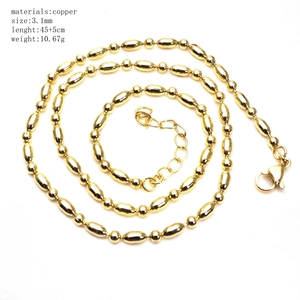 Detail of 45cm gold copper bead chain necklace with 3.1mm beads and extension