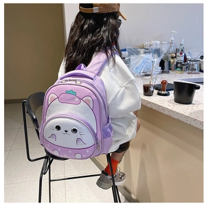 Rear view of a 3D cartoon cat backpack for girls featuring breathable mesh side pockets