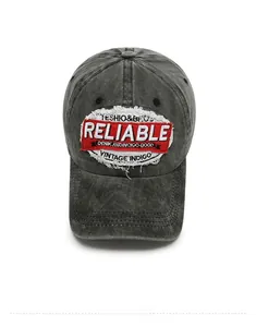 Macro detail of vintage washed cotton baseball cap with red reliable letter embroidery