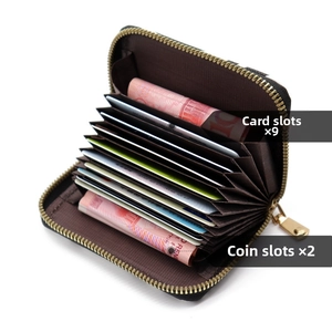 Detail view of leopard print card holder with 9 card slots and 2 cash compartments