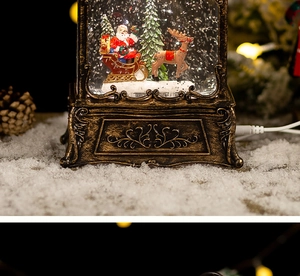 Macro shot of a vintage bronze Christmas snow globe with Santa and reindeer