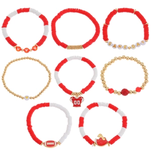 Detail of 8pcs red white gold football bracelet set featuring Game Day beads and charms