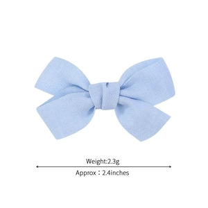 Handmade 2.4-inch light blue fabric bow hair clip for babies with 2.3g lightweight design