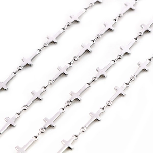 Macro detail of silver stainless steel cross chain links for DIY jewelry making