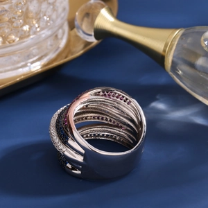Luxe multi-layer wrap ring with blue and purple micro-pave crystals on silver metal